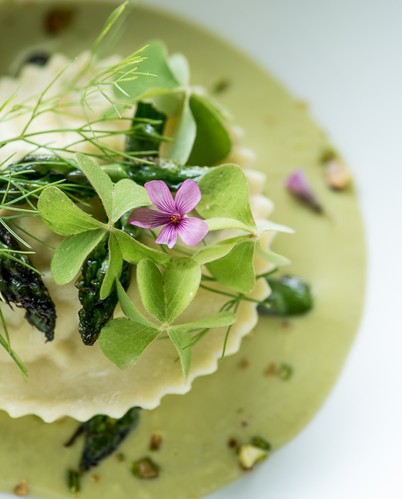 Crab ravioli in an asparagus and pistachio&nbsp;avgolemono