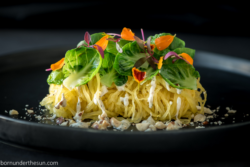 Spaghetti squash with mushroom cashew alfredo, brussels and&nbsp;hazelnuts